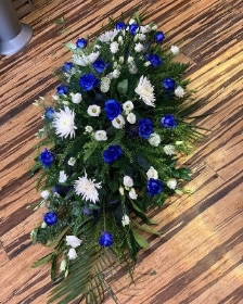 Blue rose casket  spray (4' shown)